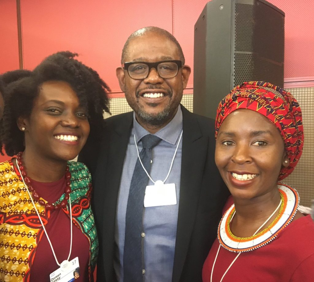 Doreen Kessy, COO with Forest Whitaker at WEF.